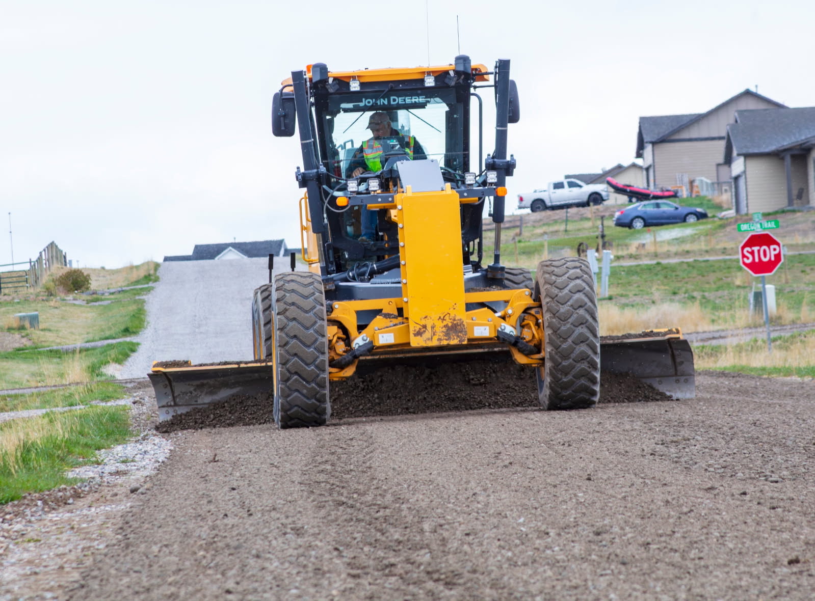DLM grader shaping a subdivision road in Three Forks, Montana